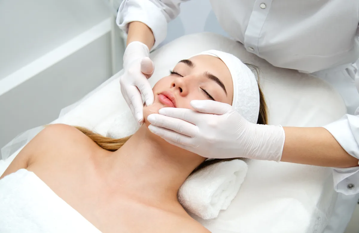 a woman getting a facial massage