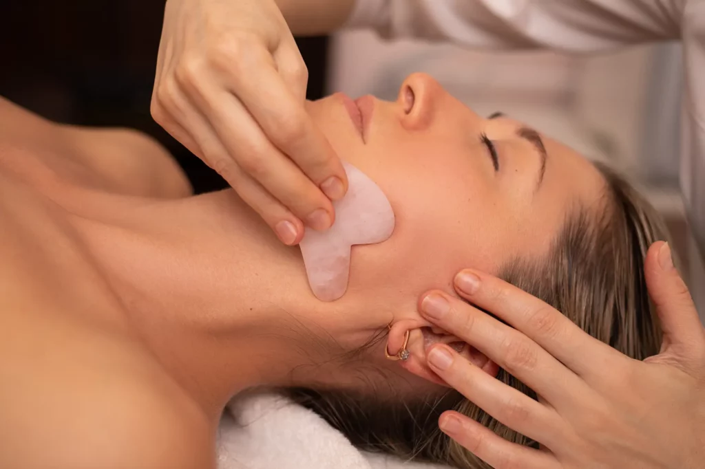 Portfolio a woman receiving a face massage